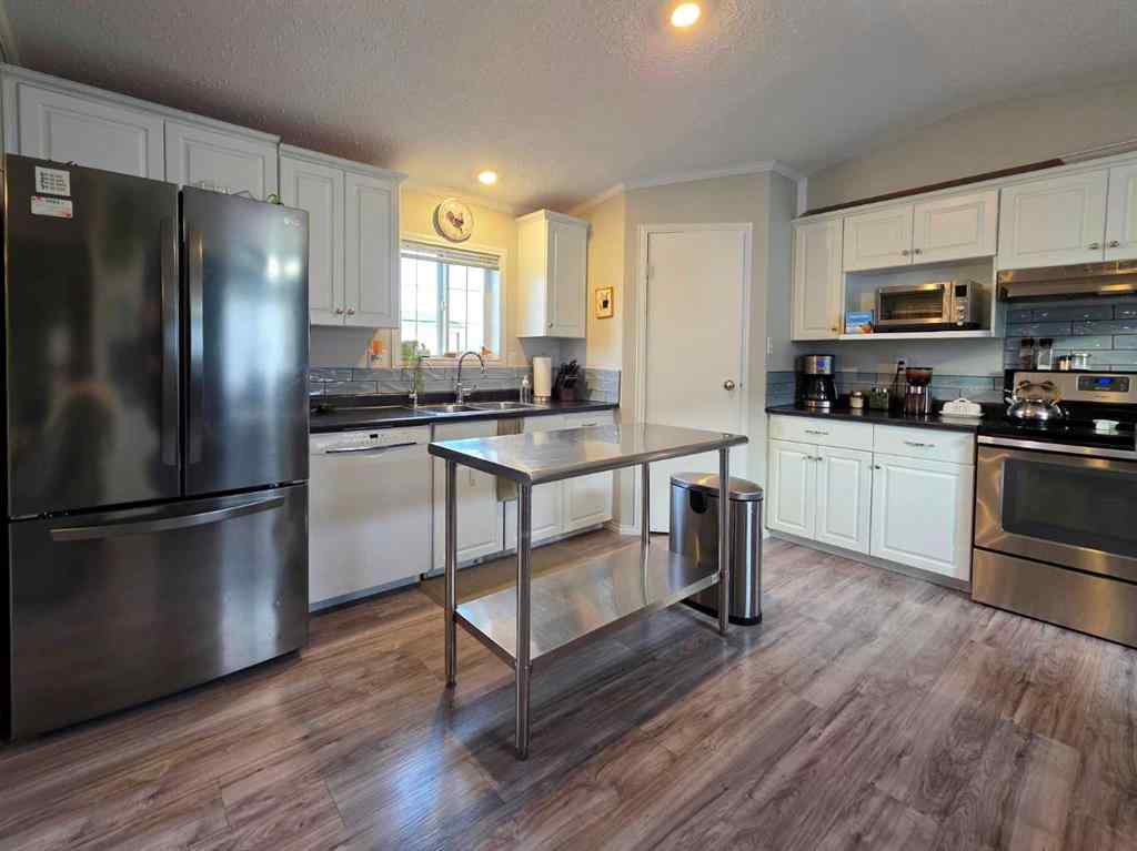 MLS&reg; # A2270214 - 331 3 Street NW in NONE Redcliff, Residential Open Houses