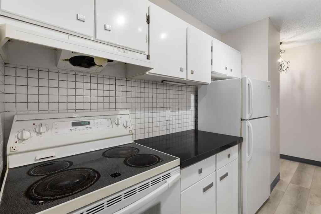 MLS&reg; # A2270259 - Unit #704 4944 Dalton Drive NW in Dalhousie Calgary, Residential Open Houses