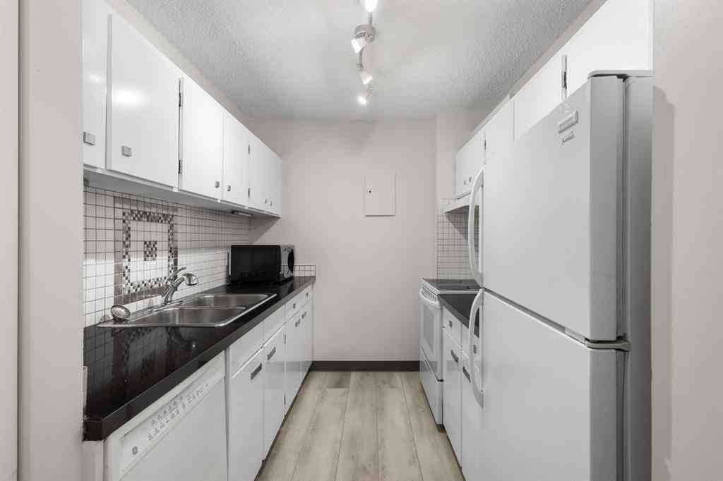 MLS&reg; # A2270259 - Unit #704 4944 Dalton Drive NW in Dalhousie Calgary, Residential Open Houses