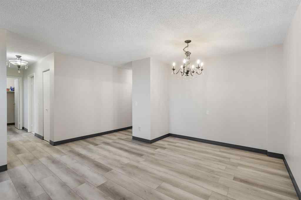 MLS&reg; # A2270259 - Unit #704 4944 Dalton Drive NW in Dalhousie Calgary, Residential Open Houses