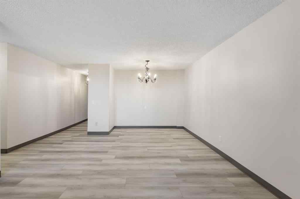 MLS&reg; # A2270259 - Unit #704 4944 Dalton Drive NW in Dalhousie Calgary, Residential Open Houses