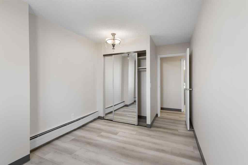 MLS&reg; # A2270259 - Unit #704 4944 Dalton Drive NW in Dalhousie Calgary, Residential Open Houses