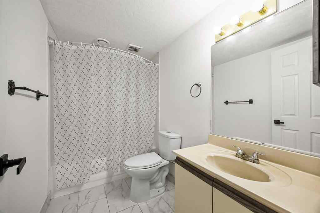 MLS® A2270260 - 212 Falmere Way NE in Falconridge Calgary, Residential