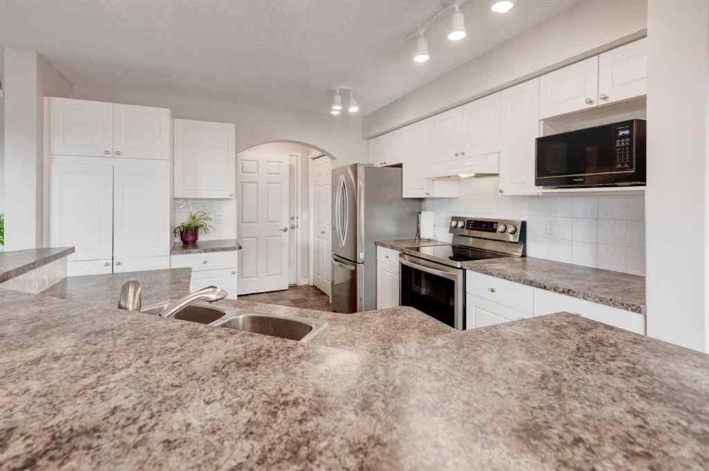 MLS® A2270286 - 45 Cougarstone Place SW in Cougar Ridge Calgary, Residential