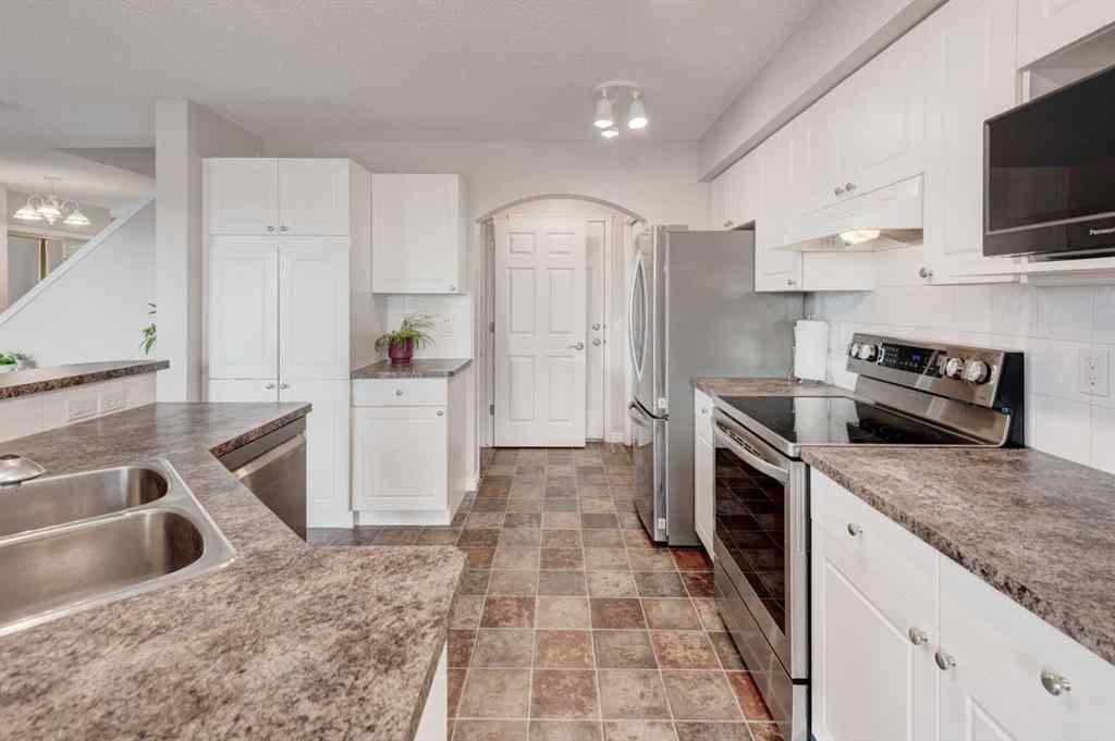 MLS® A2270286 - 45 Cougarstone Place SW in Cougar Ridge Calgary, Residential