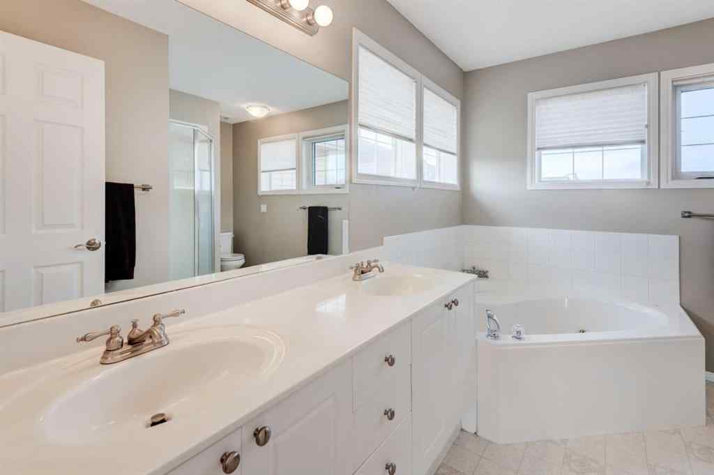 MLS® A2270286 - 45 Cougarstone Place SW in Cougar Ridge Calgary, Residential