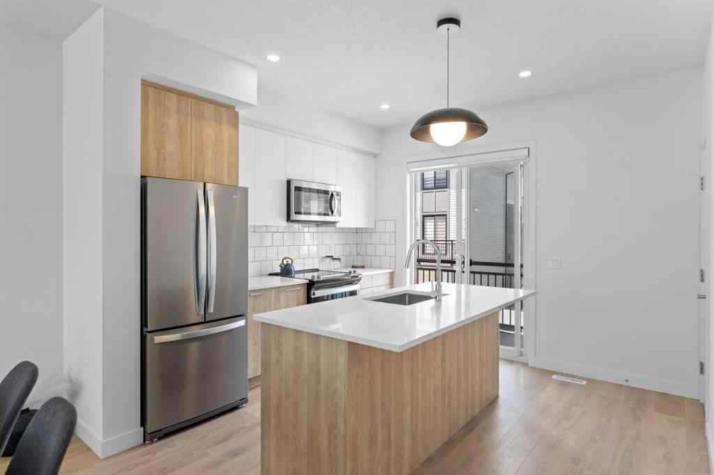 MLS&reg; # A2270339 - Unit #519 857 Belmont Drive SW in Belmont Calgary, Residential Open Houses