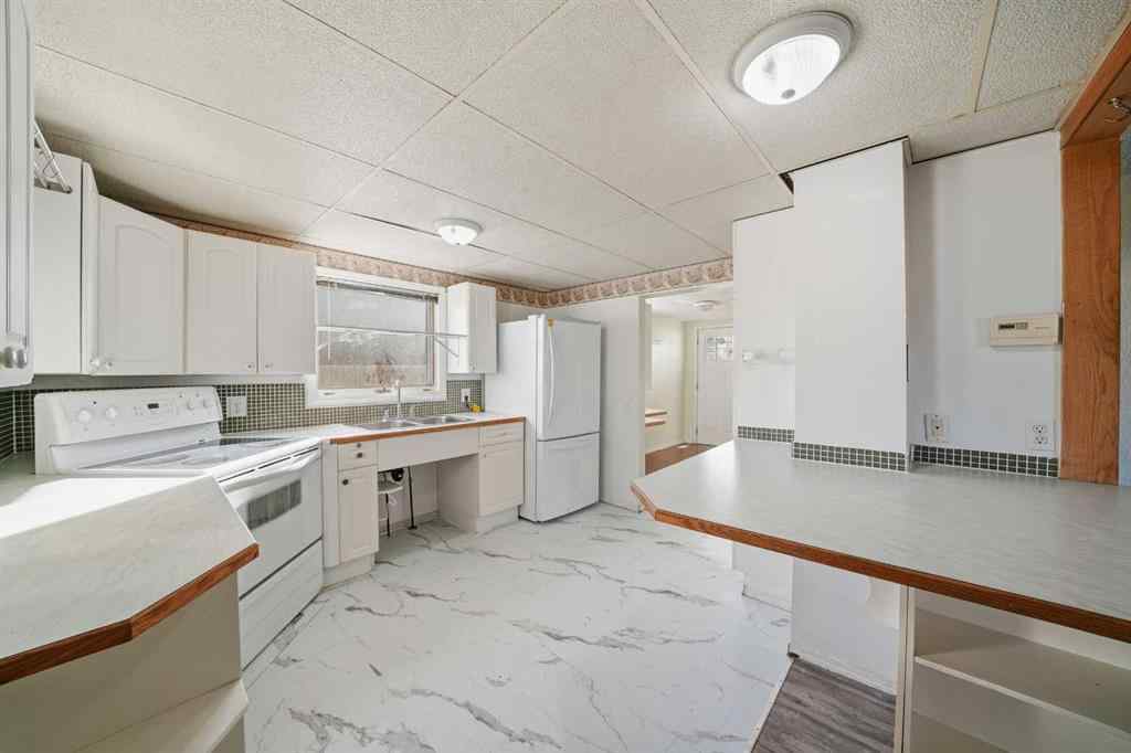 MLS&reg; # A2270423 - 1221 Lucina Street  in Hawkridge Estates Penhold, Commercial Open Houses