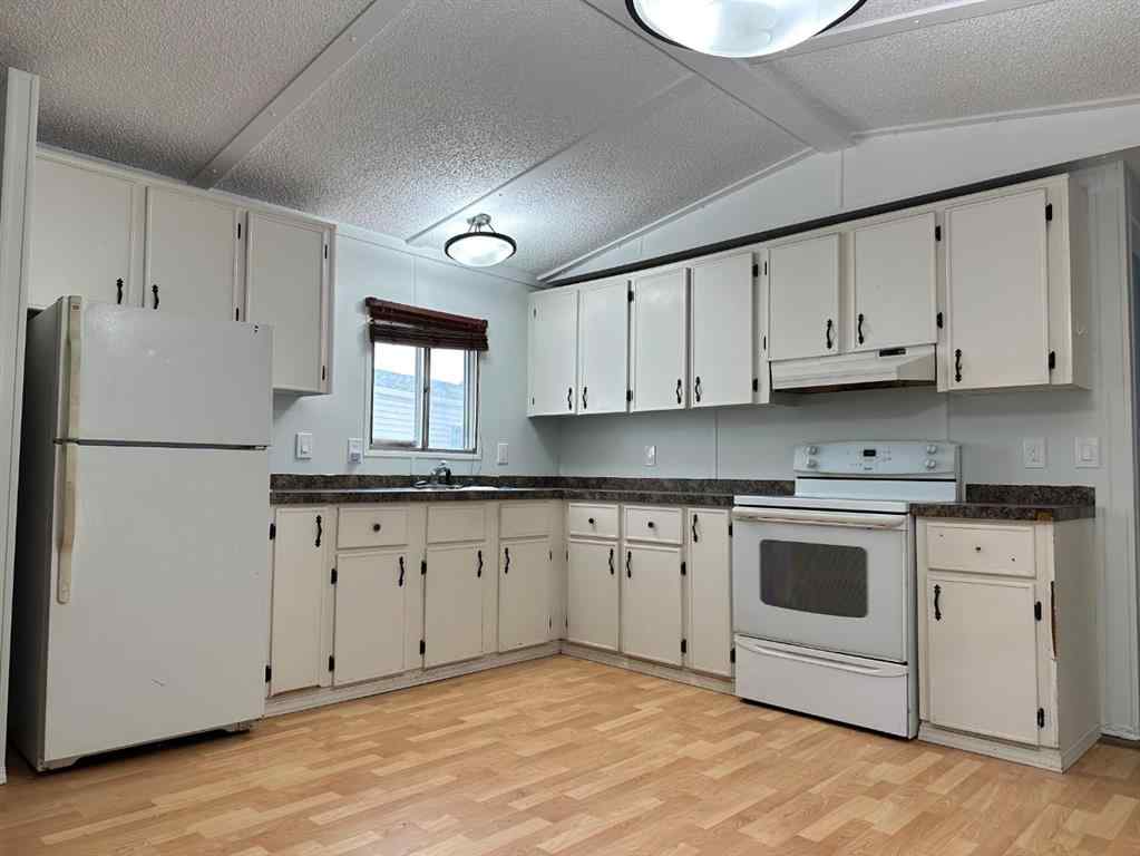 MLS&reg; # A2270427 - 92 Coachman Village  in MH - Coachman Grande Prairie, Mobile Open Houses