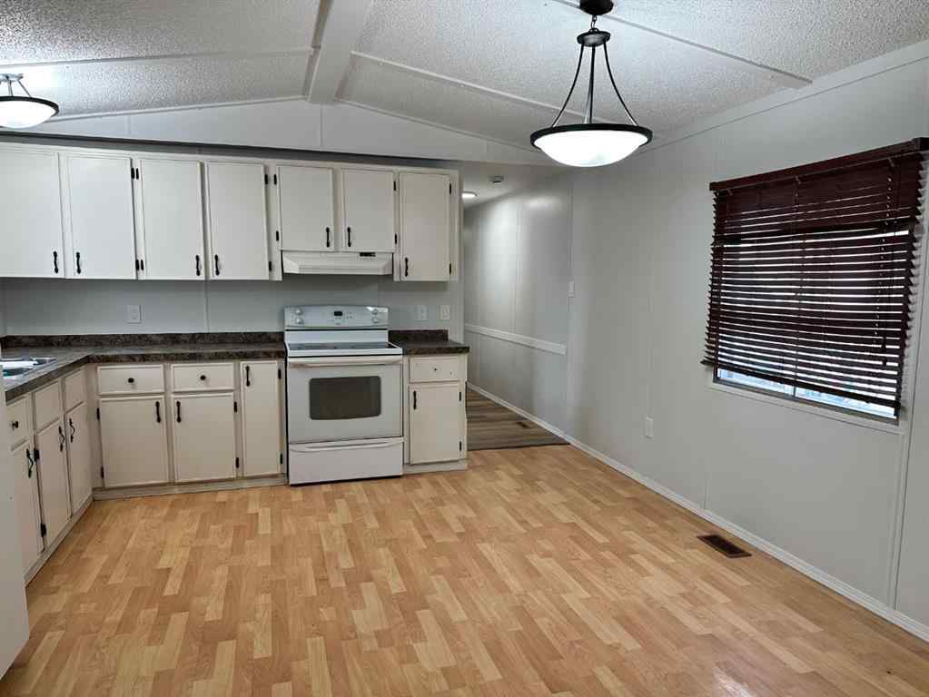 MLS&reg; # A2270427 - 92 Coachman Village  in MH - Coachman Grande Prairie, Mobile Open Houses