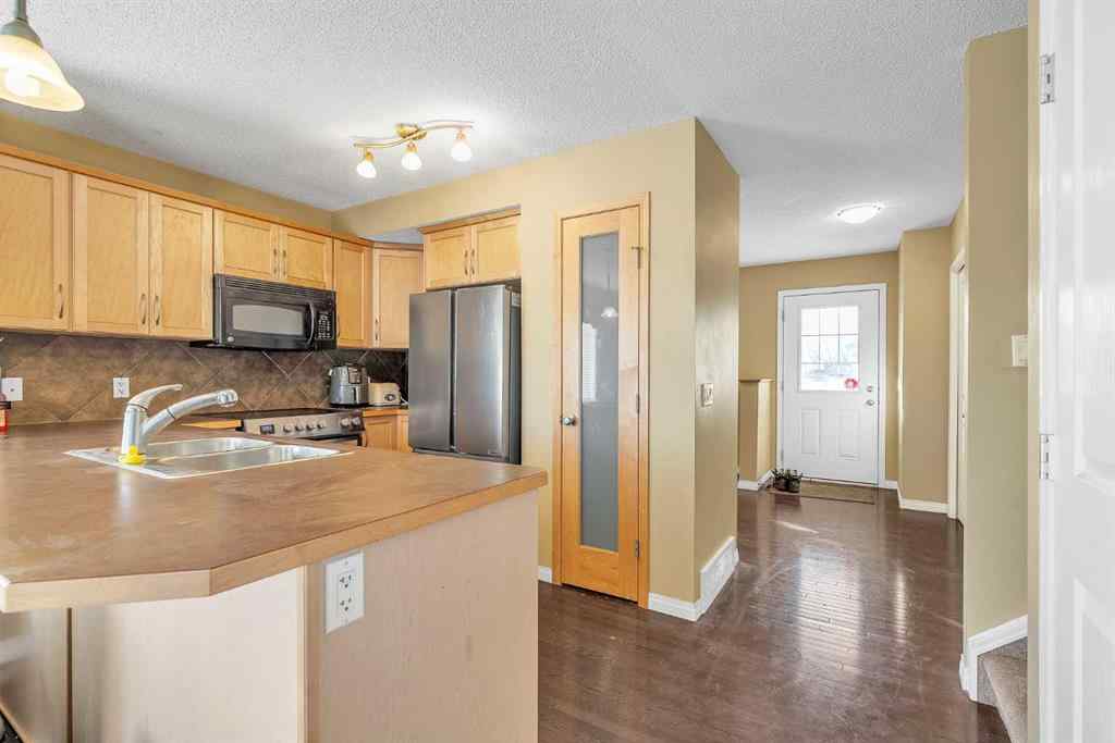 MLS&reg; # A2270441 - Unit #101 2384 Sagewood Gate SW in Sagewood Airdrie, Residential Open Houses