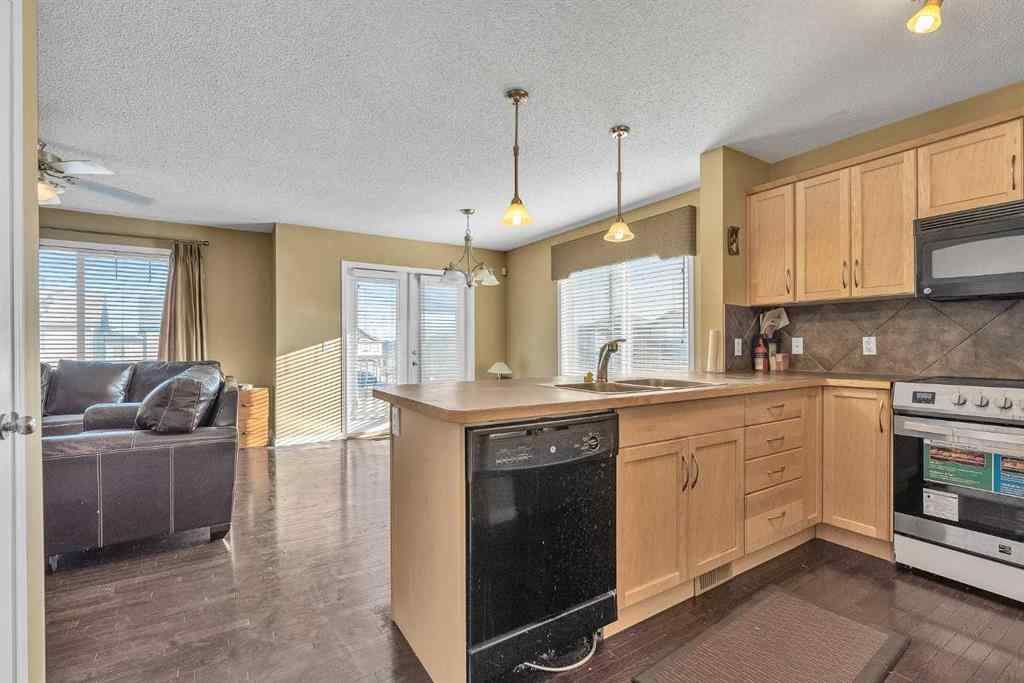 MLS&reg; # A2270441 - Unit #101 2384 Sagewood Gate SW in Sagewood Airdrie, Residential Open Houses