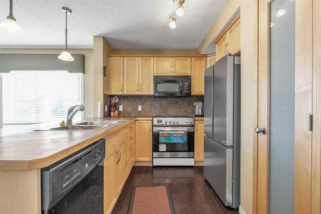 MLS&reg; # A2270441 - Unit #101 2384 Sagewood Gate SW in Sagewood Airdrie, Residential Open Houses