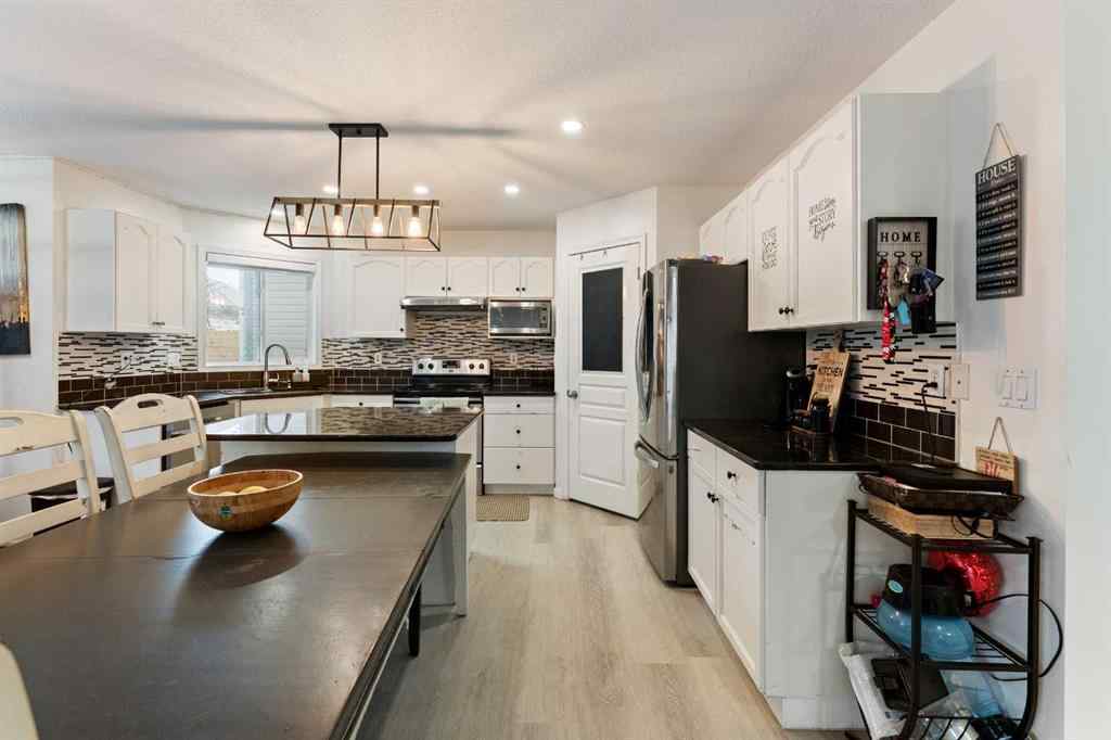 MLS&reg; # A2270444 - 140 Fairways Drive NW in Fairways Airdrie, Residential Open Houses