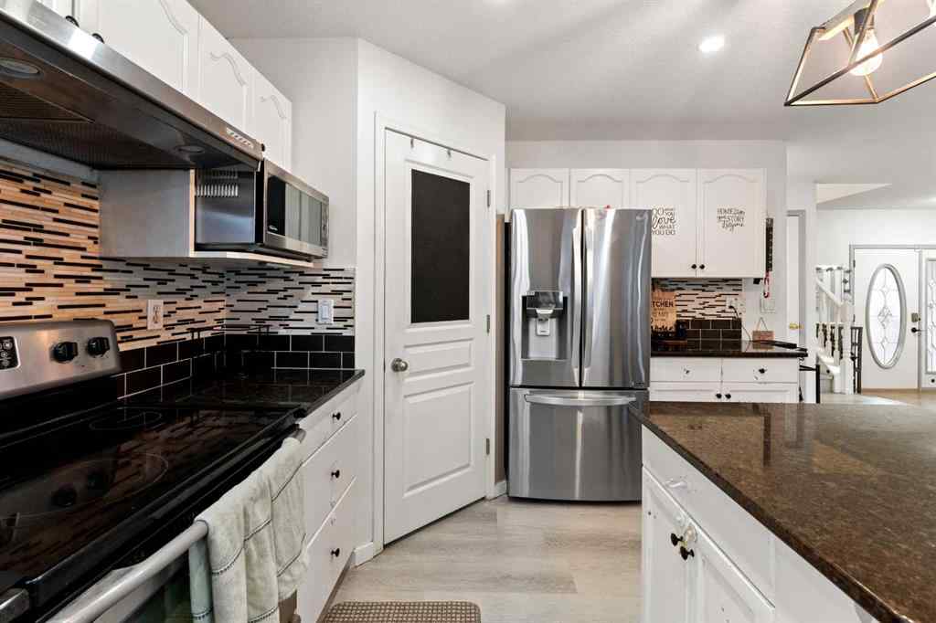 MLS&reg; # A2270444 - 140 Fairways Drive NW in Fairways Airdrie, Residential Open Houses