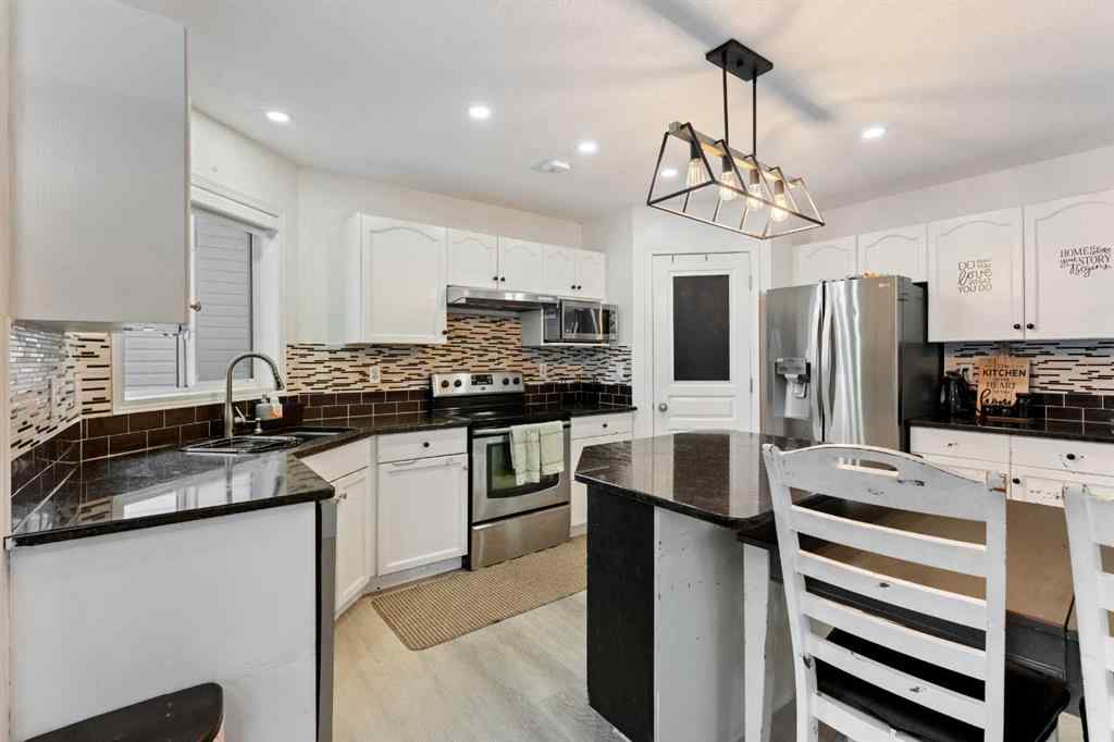 MLS&reg; # A2270444 - 140 Fairways Drive NW in Fairways Airdrie, Residential Open Houses