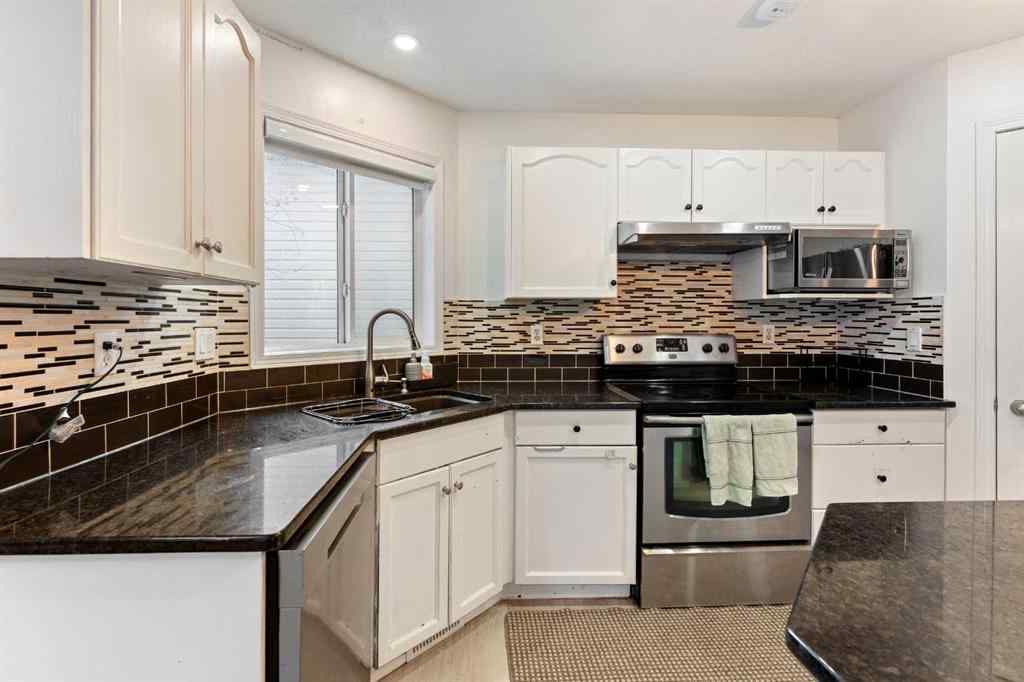 MLS&reg; # A2270444 - 140 Fairways Drive NW in Fairways Airdrie, Residential Open Houses