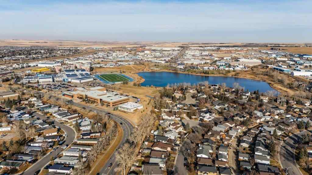 MLS&reg; # A2270466 - 1220 Meadowbrook Drive SE in Meadowbrook Airdrie, Residential Open Houses