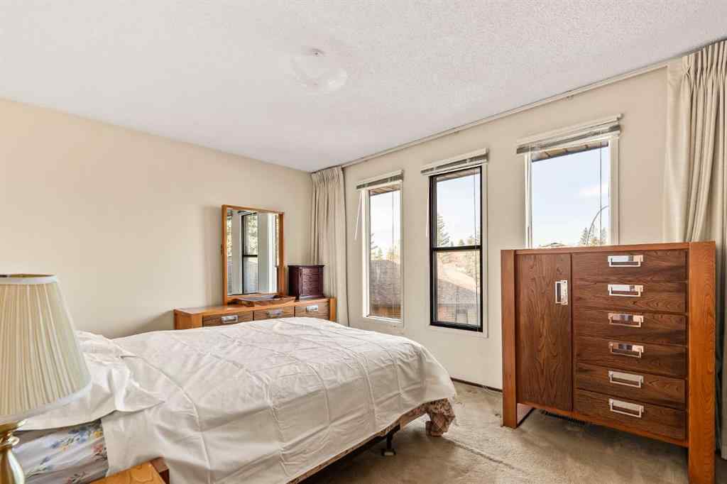 MLS&reg; # A2270497 - 16 Edgeland Bay NW in Edgemont Calgary, Residential Open Houses