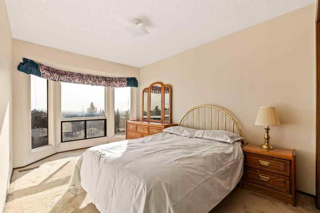 MLS&reg; # A2270497 - 16 Edgeland Bay NW in Edgemont Calgary, Residential Open Houses