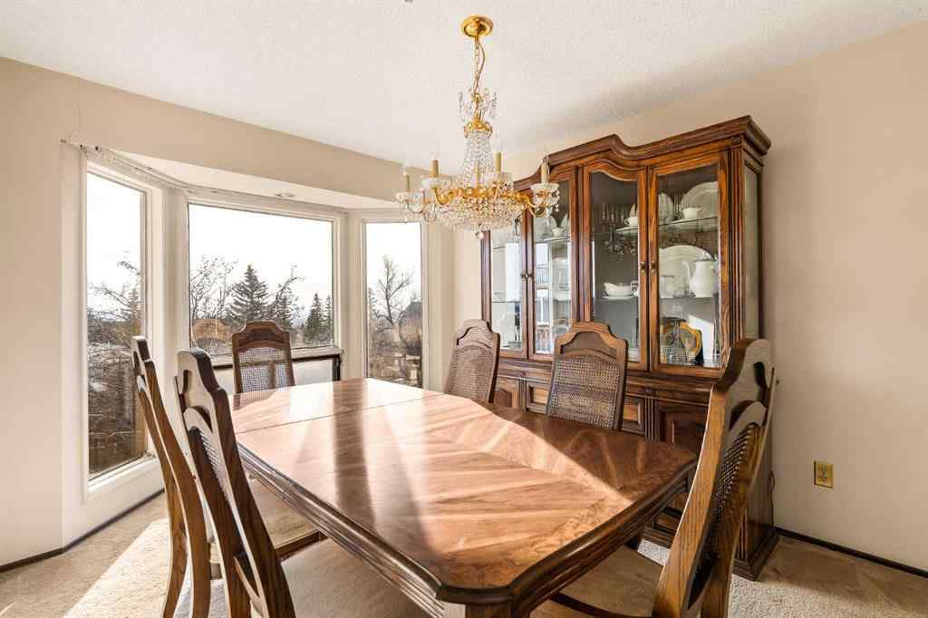 MLS&reg; # A2270497 - 16 Edgeland Bay NW in Edgemont Calgary, Residential Open Houses