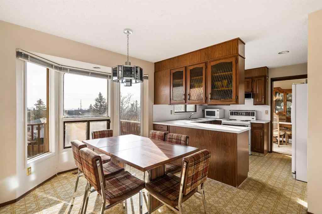 MLS&reg; # A2270497 - 16 Edgeland Bay NW in Edgemont Calgary, Residential Open Houses