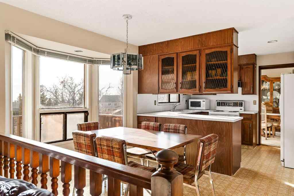 MLS&reg; # A2270497 - 16 Edgeland Bay NW in Edgemont Calgary, Residential Open Houses