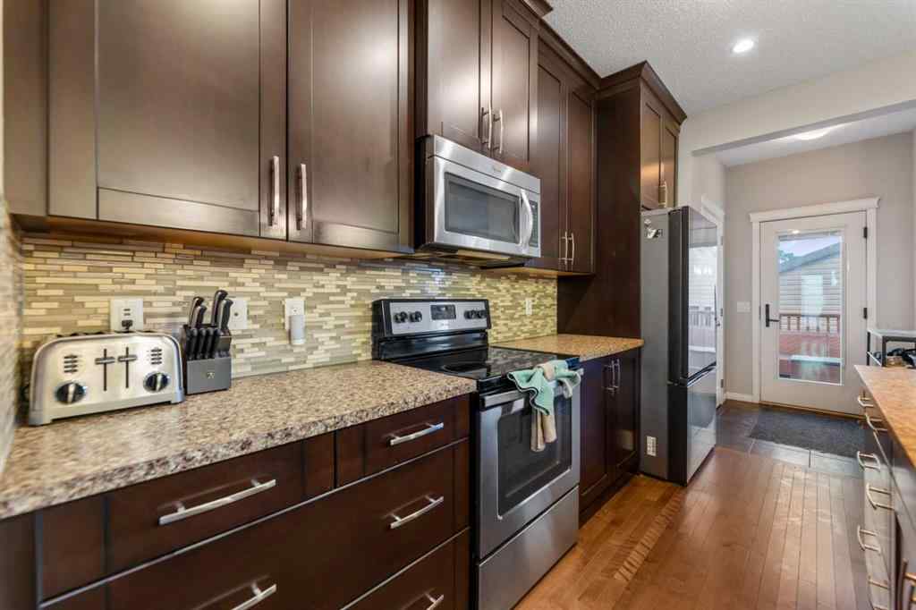 MLS&reg; # A2270499 - 1301 Reunion Place NW in Reunion Airdrie, Residential Open Houses