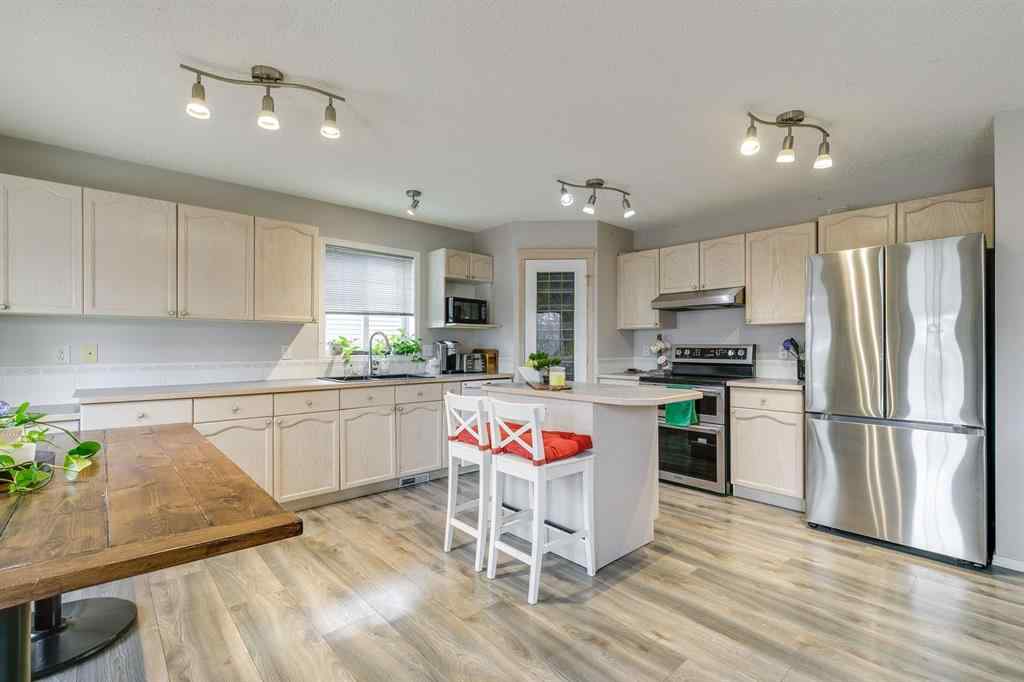 MLS® # A2270533 - 228 Woodhaven Drive  in Cimarron Hill Okotoks, Residential Open Houses