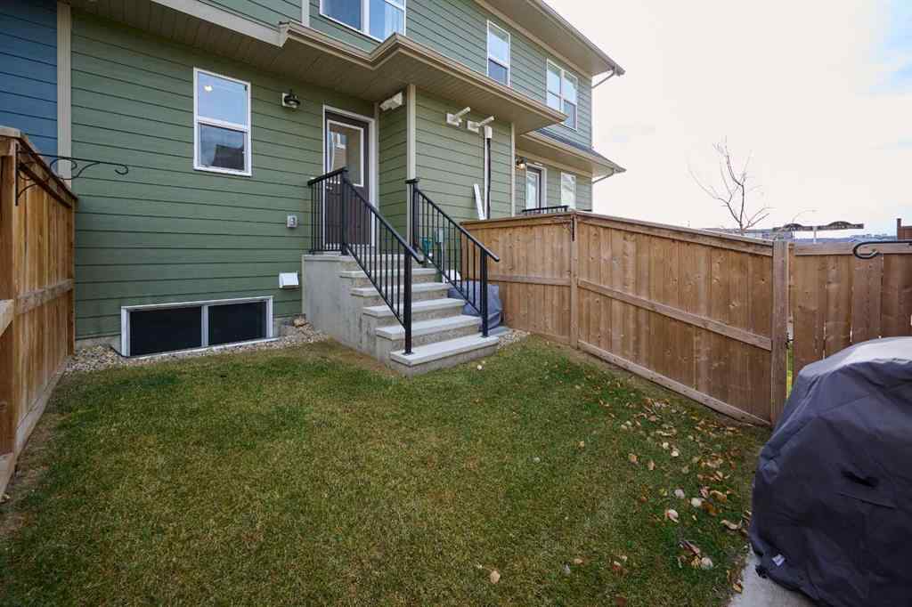 MLS&reg; # A2270542 - 352 Cranbrook Square SE in Cranston Calgary, Residential Open Houses