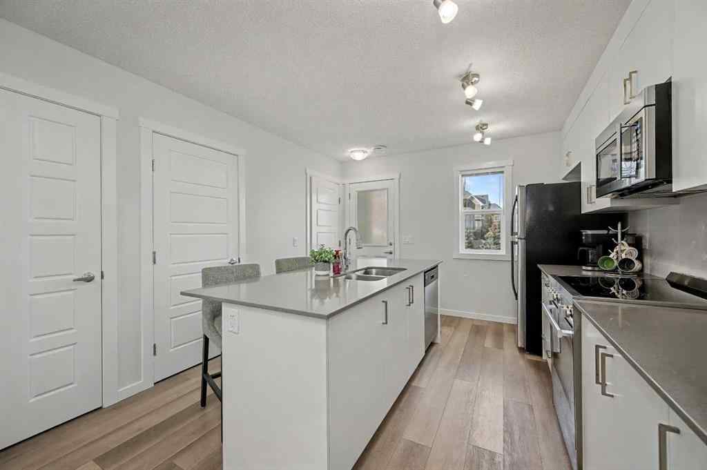 MLS&reg; # A2270542 - 352 Cranbrook Square SE in Cranston Calgary, Residential Open Houses