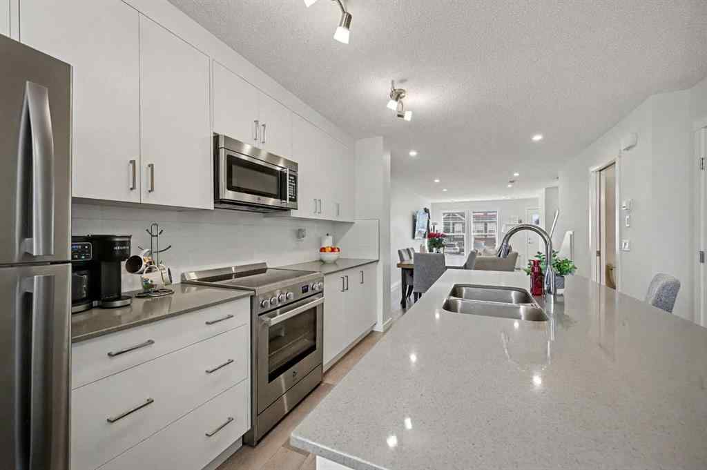 MLS&reg; # A2270542 - 352 Cranbrook Square SE in Cranston Calgary, Residential Open Houses