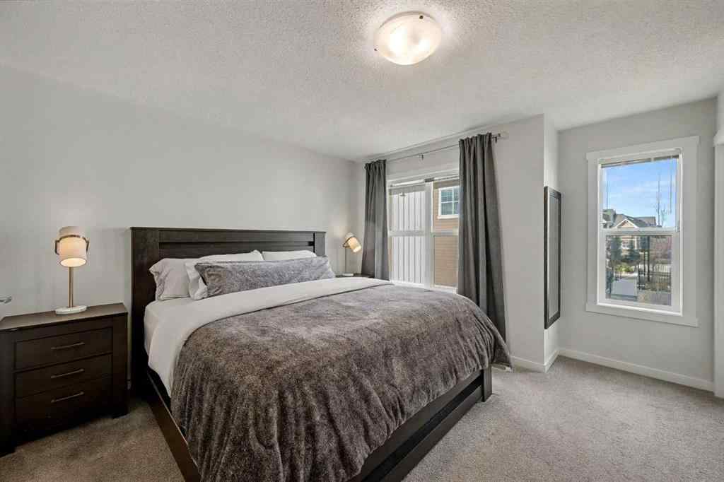 MLS&reg; # A2270542 - 352 Cranbrook Square SE in Cranston Calgary, Residential Open Houses