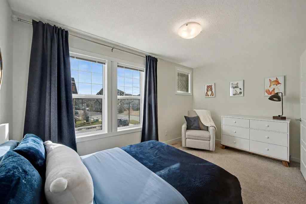 MLS&reg; # A2270542 - 352 Cranbrook Square SE in Cranston Calgary, Residential Open Houses