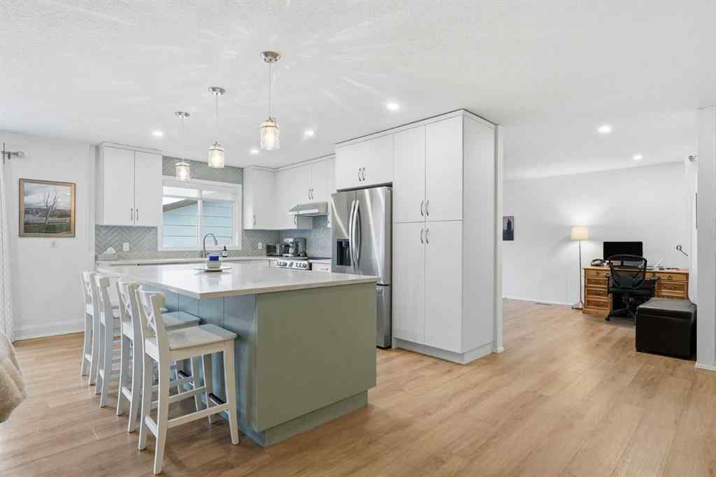 MLS&reg; # A2270563 - 60 Sunmount Close SE in Sundance Calgary, Residential Open Houses