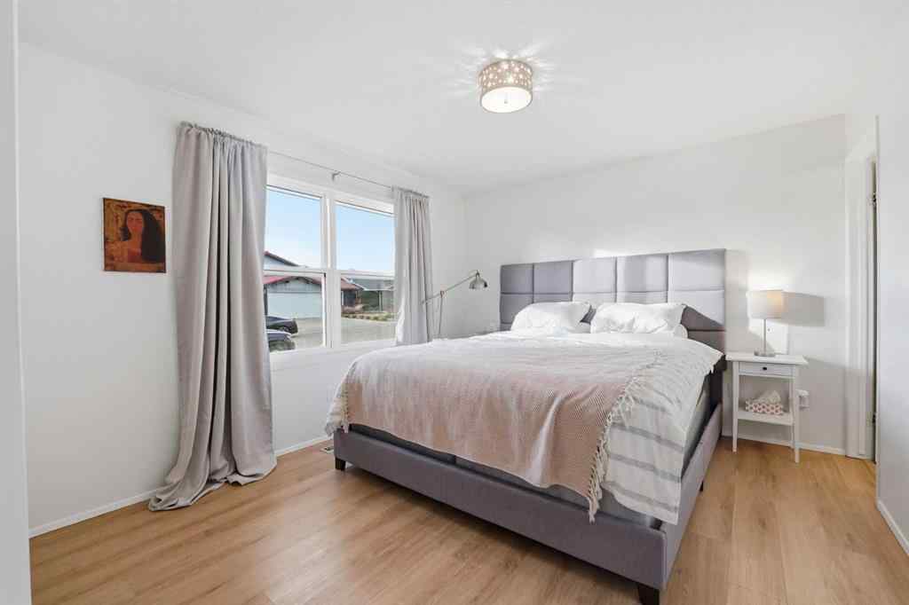 MLS&reg; # A2270563 - 60 Sunmount Close SE in Sundance Calgary, Residential Open Houses