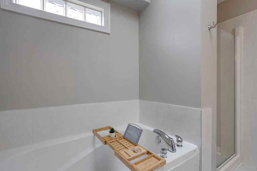 MLS&reg; # A2270592 - Unit #1 219 17 Avenue NE in Tuxedo Park Calgary, Residential Open Houses