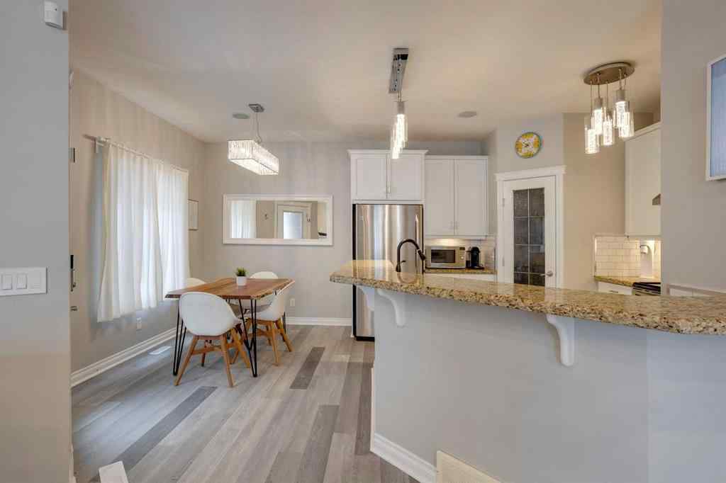 MLS&reg; # A2270592 - Unit #1 219 17 Avenue NE in Tuxedo Park Calgary, Residential Open Houses