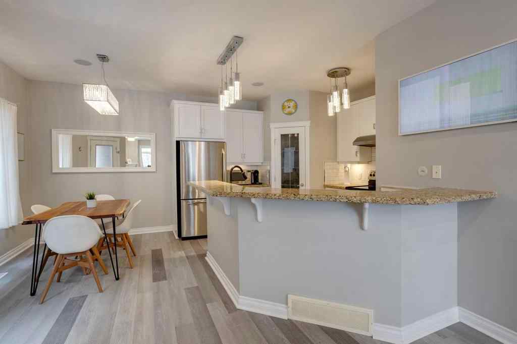 MLS&reg; # A2270592 - Unit #1 219 17 Avenue NE in Tuxedo Park Calgary, Residential Open Houses