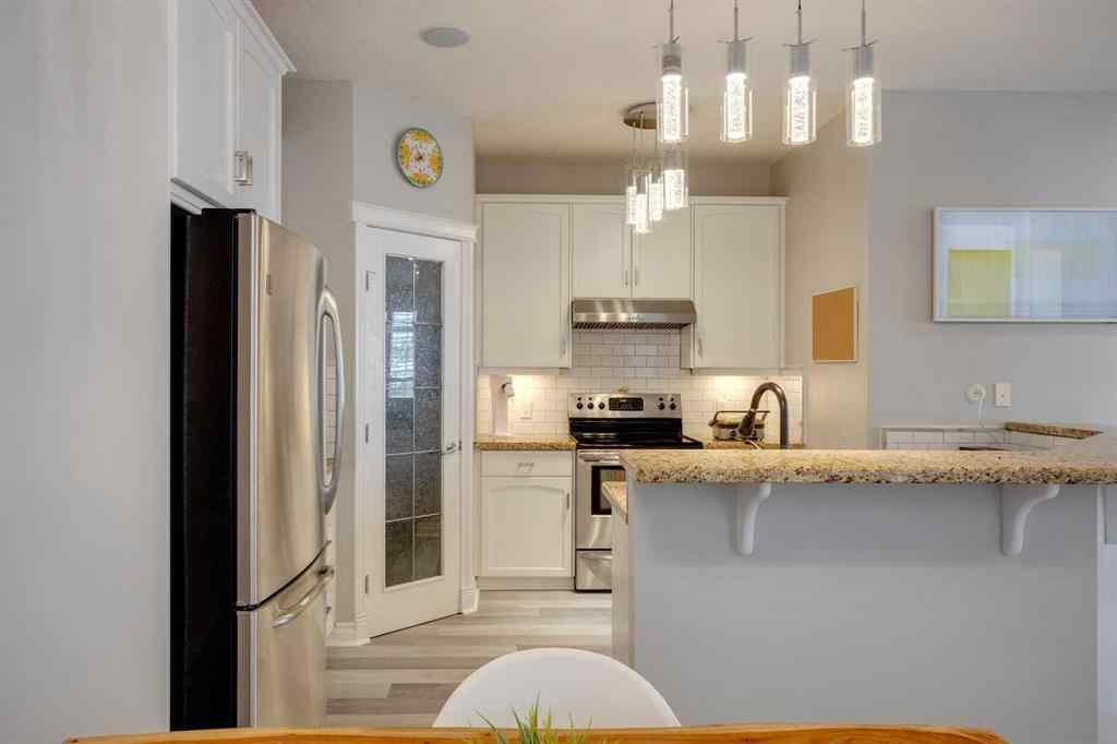 MLS&reg; # A2270592 - Unit #1 219 17 Avenue NE in Tuxedo Park Calgary, Residential Open Houses