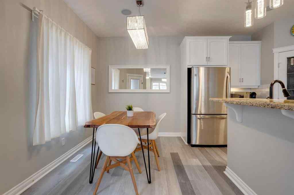 MLS&reg; # A2270592 - Unit #1 219 17 Avenue NE in Tuxedo Park Calgary, Residential Open Houses