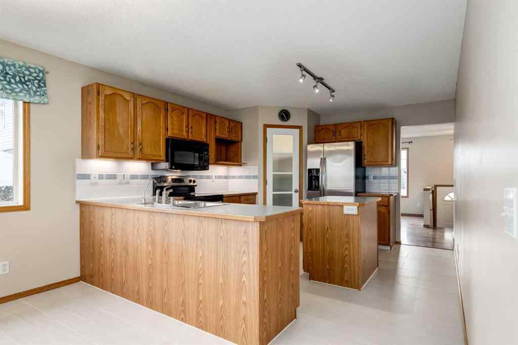 MLS® # A2270603 - 8 Canoe Circle SW in Canals Airdrie, Residential Open Houses