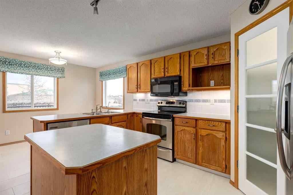 MLS® # A2270603 - 8 Canoe Circle SW in Canals Airdrie, Residential Open Houses