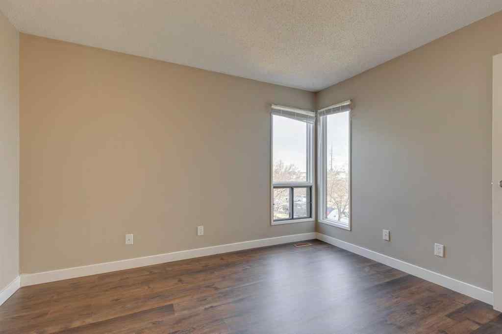 MLS&reg; # A2270634 - Unit #1 102 Grier Terrace NE in Greenview Calgary, Residential Open Houses