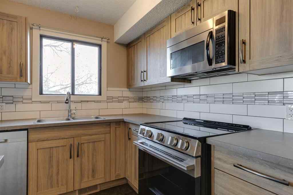 MLS&reg; # A2270634 - Unit #1 102 Grier Terrace NE in Greenview Calgary, Residential Open Houses