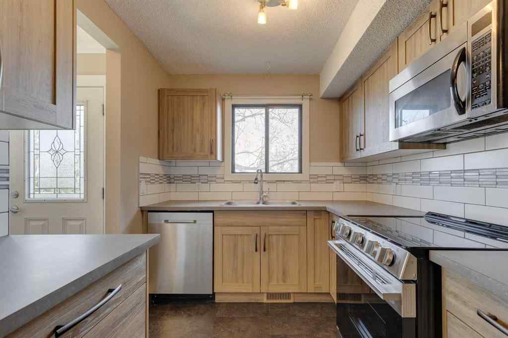 MLS&reg; # A2270634 - Unit #1 102 Grier Terrace NE in Greenview Calgary, Residential Open Houses