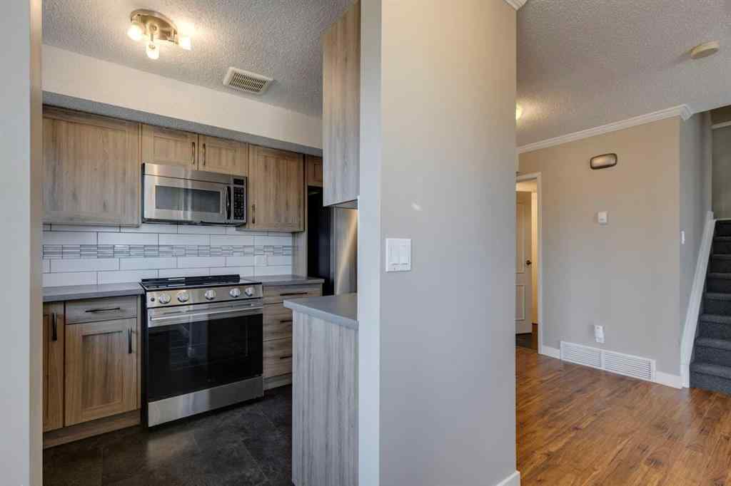 MLS&reg; # A2270634 - Unit #1 102 Grier Terrace NE in Greenview Calgary, Residential Open Houses