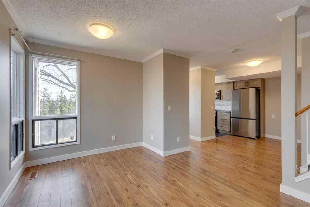 MLS&reg; # A2270634 - Unit #1 102 Grier Terrace NE in Greenview Calgary, Residential Open Houses