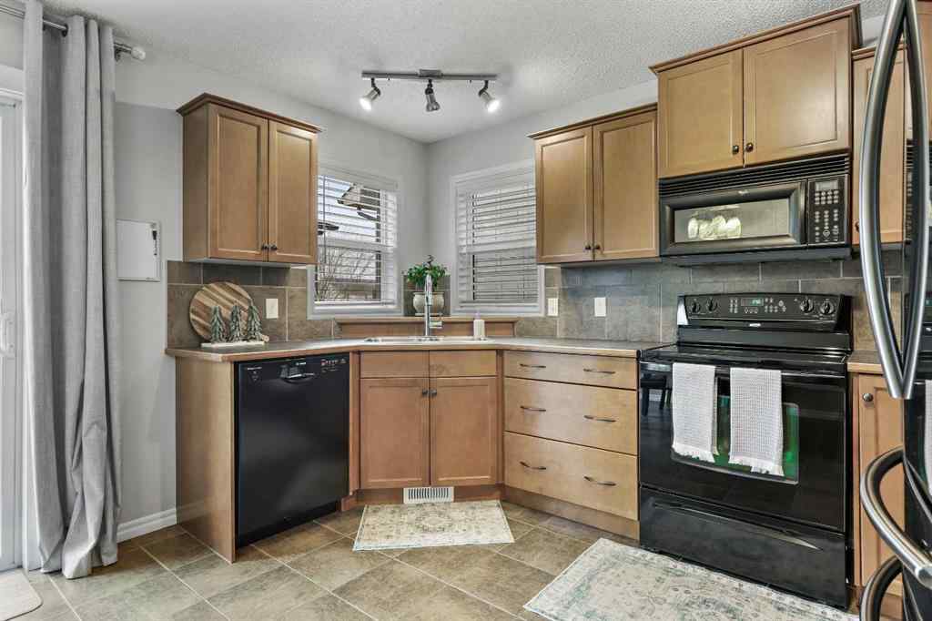 MLS® # A2270671 - 25 McKinnon Street NW in NONE Langdon, Residential Open Houses