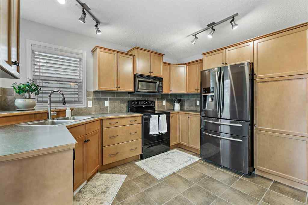 MLS® # A2270671 - 25 McKinnon Street NW in NONE Langdon, Residential Open Houses